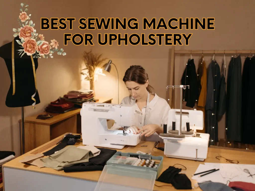 A white modern sewing machine for upholstery on a wooden desk with fabric and sewing supplies in a workshop with a mannequin and a rack of clothes.

