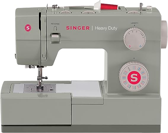 A Singer Heavy Duty 4452 Sewing Machine in light gray with a large sewing area and a metal needle, ideal for sewing upholstery
