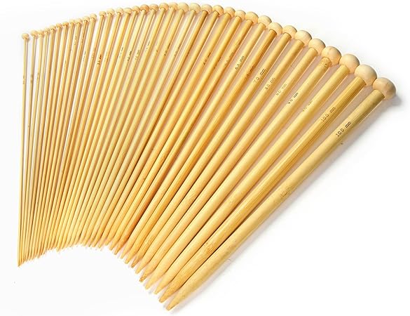 A fan-shaped array of bamboo knitting needles with different sizes marked on them