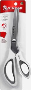  A pair of Singer pinking shears with stainless steel blades and grey handles in its packaging on a white background