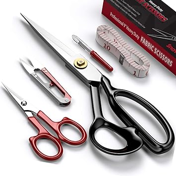 A pair of Snavida Fabric Scissors with sharp, sleek design, alongside a smaller pair and sewing accessories, ideal for precise cuts in various fabrics - a top pick for sewing enthusiasts in 2024.